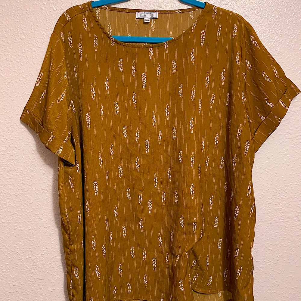 A dip of Darling Feather Blouse